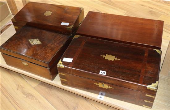 Four 19th century writing slopes largest 50cm